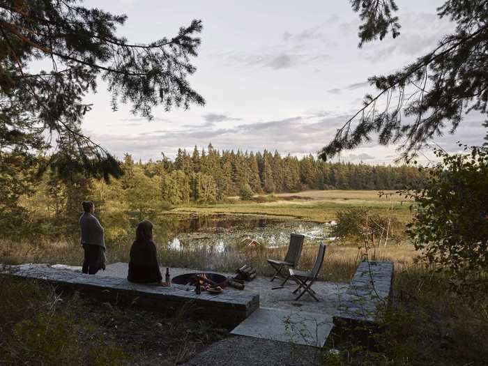 ... and family members can step outside to a fireside patio where they can watch the sun set over the fields.