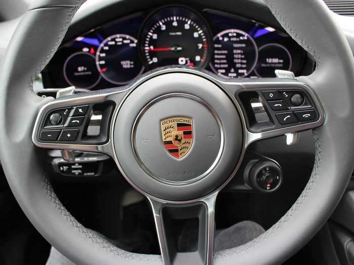 The thick, topstitched, multi-function steering wheel is heated, as are the front seats. The tachometer is front and center in the instrument cluster, and the drive-mode selector is located on the lower right. You have Normal, Sport, Sport-Plus, and an Individual mode to choose from.