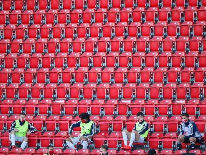 In Germany, substitute soccer players head to the stands where they can keep their distance.