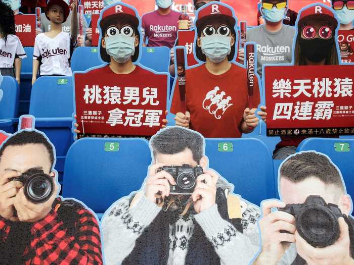 A stadium in Taiwan made sure to include members of the press among their cutouts.