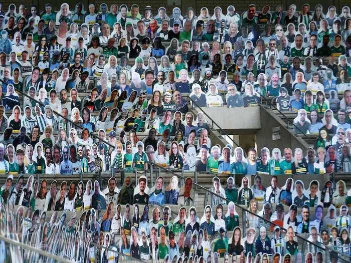 Stadiums around the world have filled seats with cardboard cutouts, like this one in Germany.