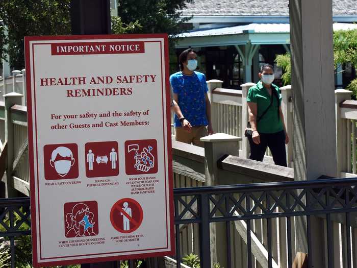 The reopening is not without major adjustments at the resort, including a host of health and safety precautions. Signs reminding guests of health tips are posted across the complex.