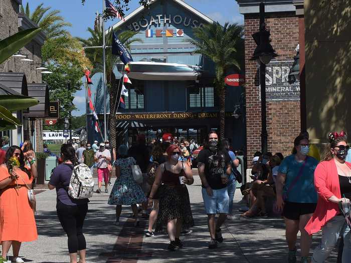 People visited Disney Springs at Walt Disney World on Wednesday, as the retail, dining, and entertainment complex began a phased reopening following the closure of the theme park on March 16, 2020 due to the coronavirus pandemic.