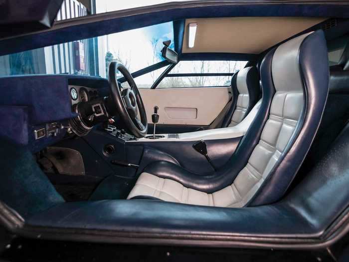 The inside is also blue but with white seat insets.