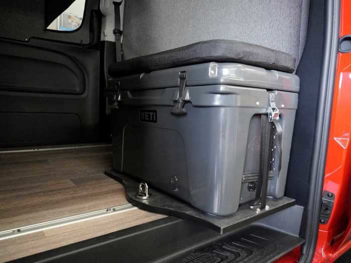 The cooler can also be used as a step to reach the "upper level" bed.