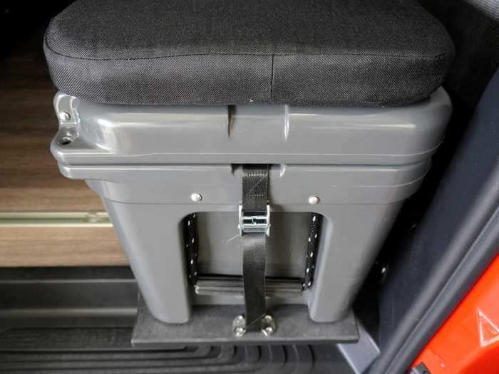 A tied-down Yeti cooler, which can double as extra seating at the dining table with its additional 2-inch cushion top, also comes optional.