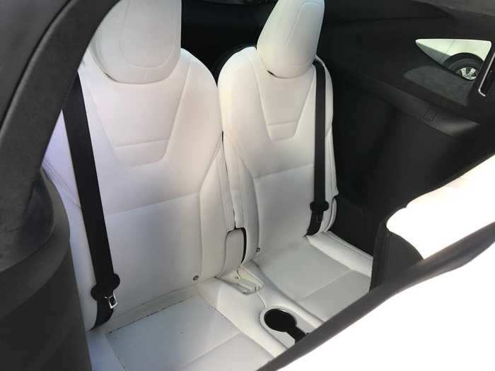 A third row is available, but because the Model X is essentially a midsize SUV, these seats are extremely cramped.