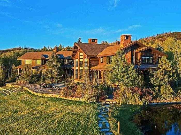 The nearly 14,000 square-foot main cabin boasts eight bedrooms, seven bathrooms, and many a lounge area or sitting room.