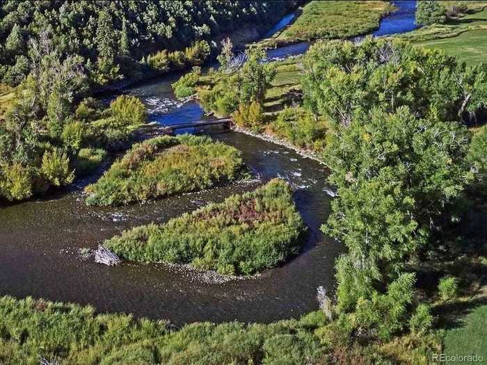 ... rafting or fishing in the river ...