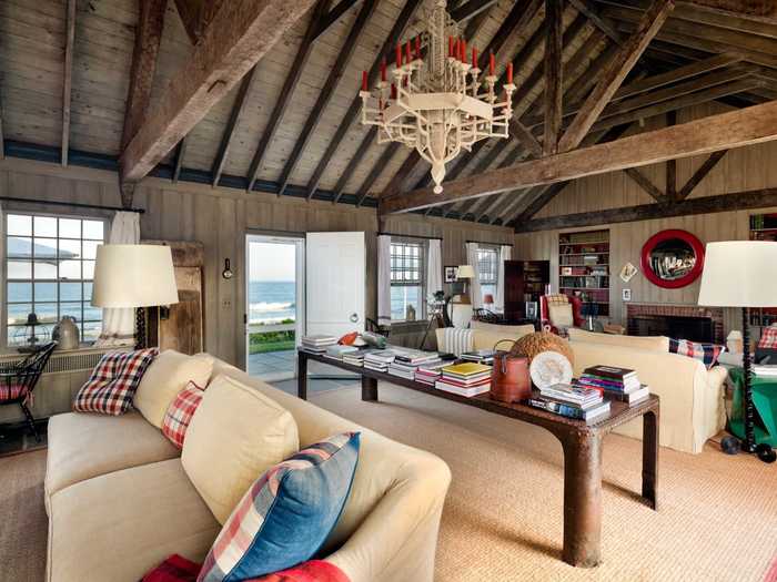 The main house features dramatic views of the Atlantic, from the living room ...