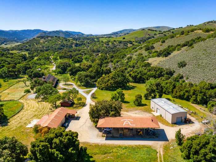 Also on the property is a private lake, a riding arena, and two barns.