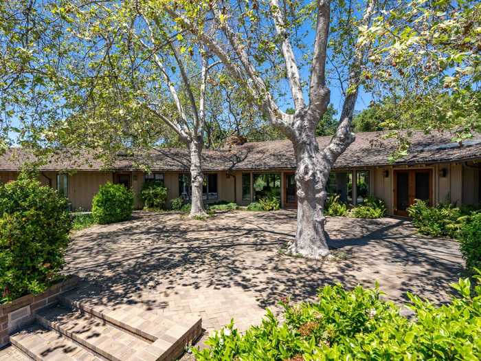 The main house has 5,413 square feet of space, one bedroom, one bathroom, and two half-baths.