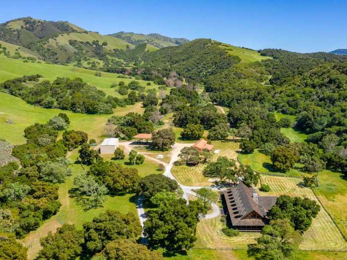 The ranch features a 5,413-square-foot main house, a guest house, and five other homes.