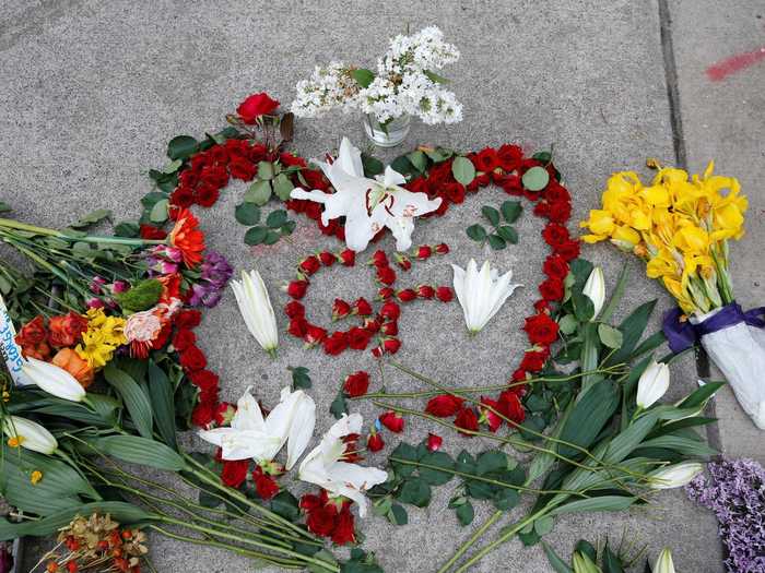 Flower memorials were placed at the site of his killing.