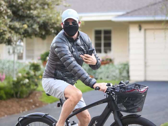 Michael Keaton wore a black mask while riding his bike in Los Angeles.