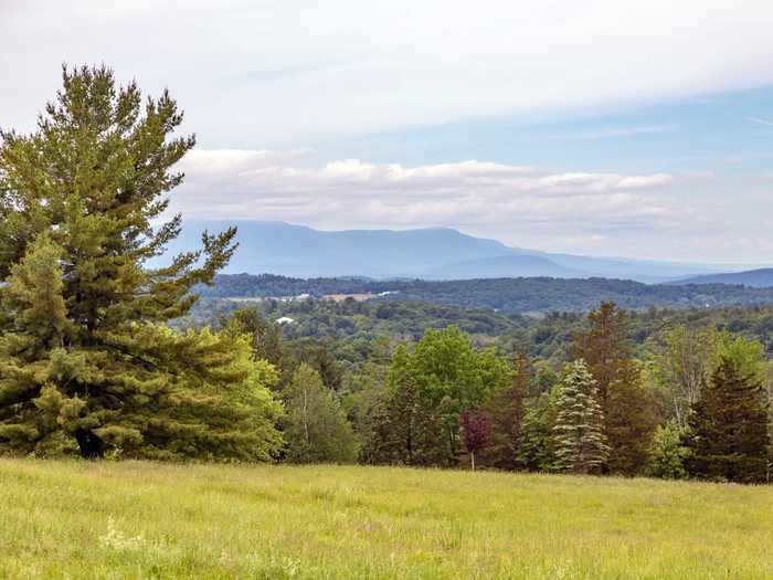 The Catskills mountains can be seen in the distance, both from the houses ...