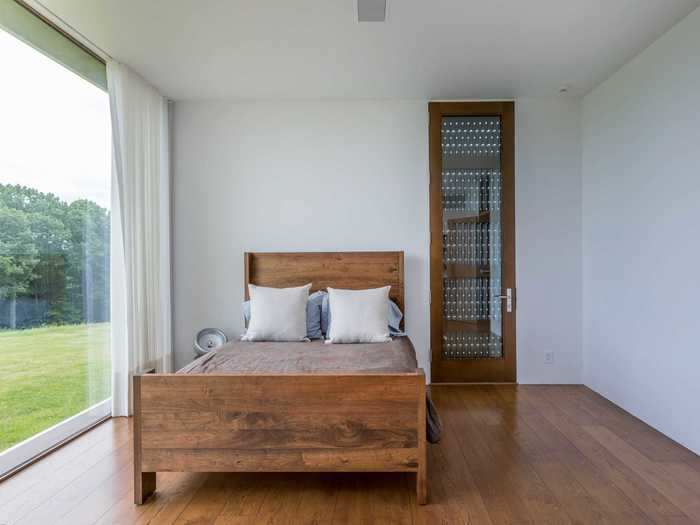 Typical of modern homes, floor-to-ceiling windows bring the outside in.