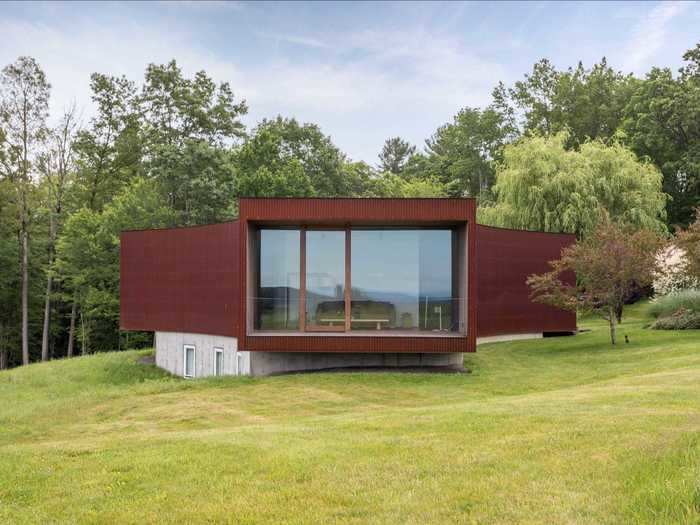 The Y-shaped guest house, by comparison, has two bedrooms and two bathrooms.