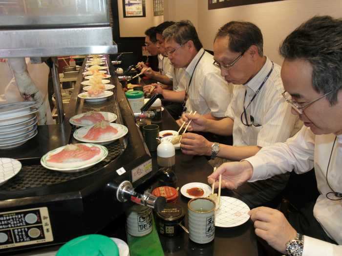 Restaurants: Before the pandemic, Tokyo residents were able to dine in close proximity at conveyor belt sushi restaurants known as kaitenzushi where they could choose from a rotating selection of fish.