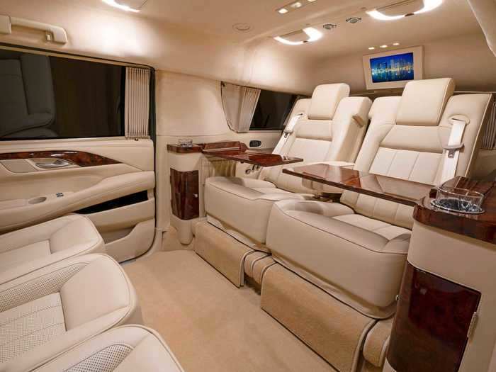 The interior includes two reclining seats, which have heating, cooling, and massage functions.