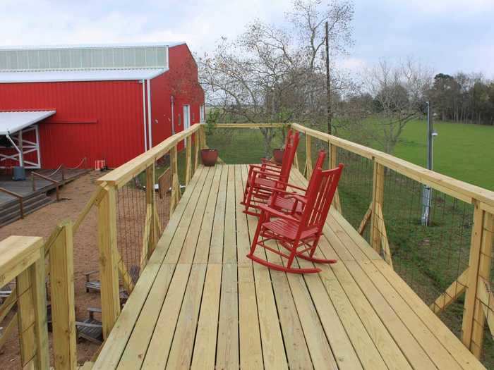 For outdoor lounging, the home has a rooftop deck with protective rails that spans the entire length of the home. The rooftop can be accessed with the stairs on the front deck.