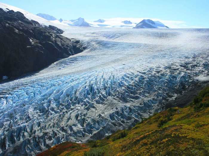 Kenai Fjords National Park in Alaska features a majestic glacier.