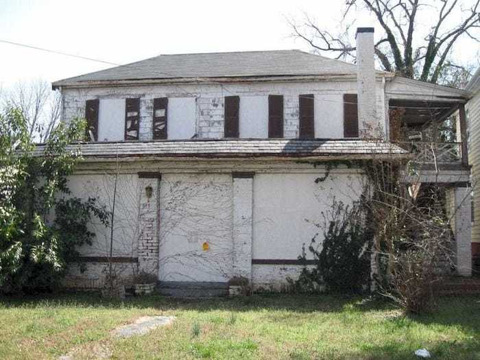 The house now stands boarded up, abandoned, and empty.