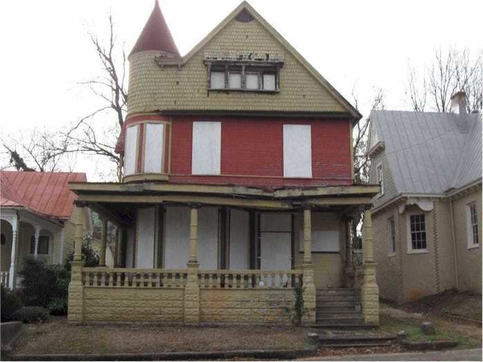 The Talley House in Danville, Virginia, is a Queen Anne Victorian home featuring turrets, carved doors, and a front porch.