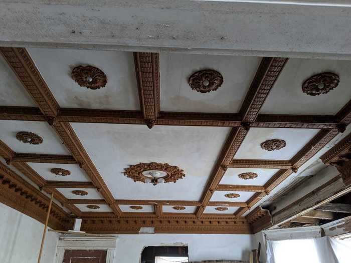 Other rooms feature intricate ceilings like this one.