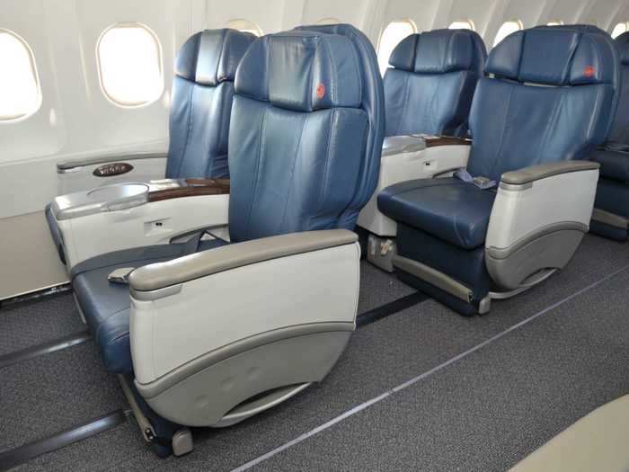 The Italian leather seats are standard business class recliners offering additional space to spread out and relax. They lack seatback entertainment but in-flight WiFi is offered.