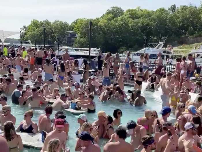 Revelers packed closely together in the water during Memorial Day weekend at Osage Beach of the Lake of the Ozarks, Missouri.