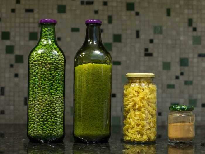 Glass wine bottles, condiment jars, and jelly containers can also be used to store your kitchen essentials.