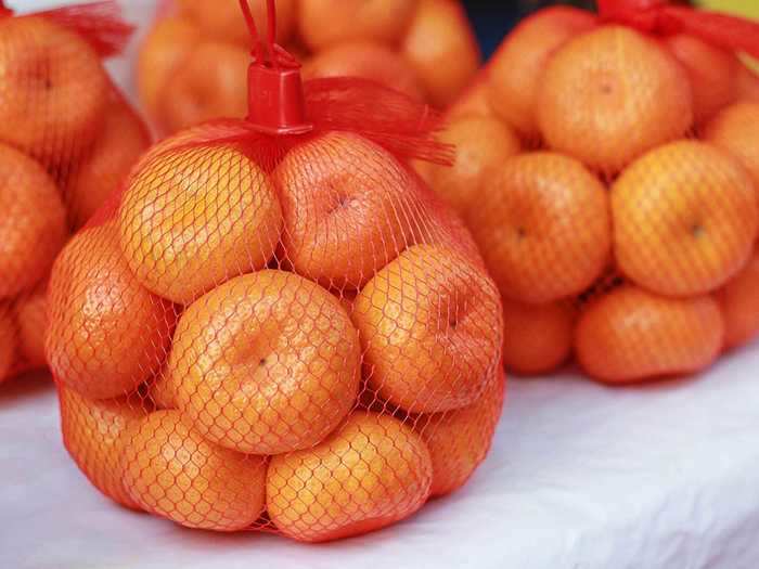 After you enjoy your clementines or oranges, hold on to the mesh packaging and use it to store bath toys.