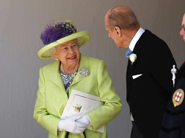 Nonetheless, Prince Philip still accompanies his wife to events from time to time, including this photo from the wedding of the Duke and Duchess of Sussex in 2018. The couple still share the same loving look that we first saw in their engagement photos all those years ago.