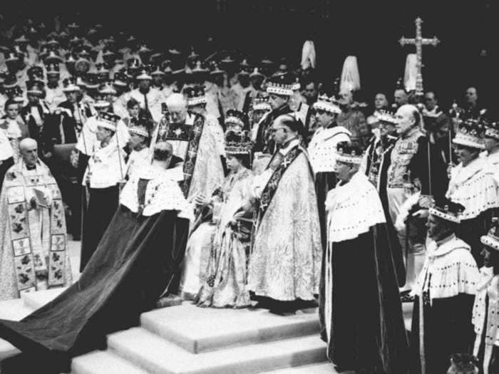 Prince Philip kneeled before the newly crowned Queen Elizabeth II at Her Majesty