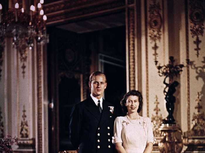 Another pre-wedding photo shows the young couple were careful not to show PDA as they stood side-by-side in Buckingham Palace.