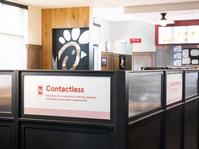 Plexiglass shields have been installed at counters and customers are encouraged to pay via app — instead of cash or card.