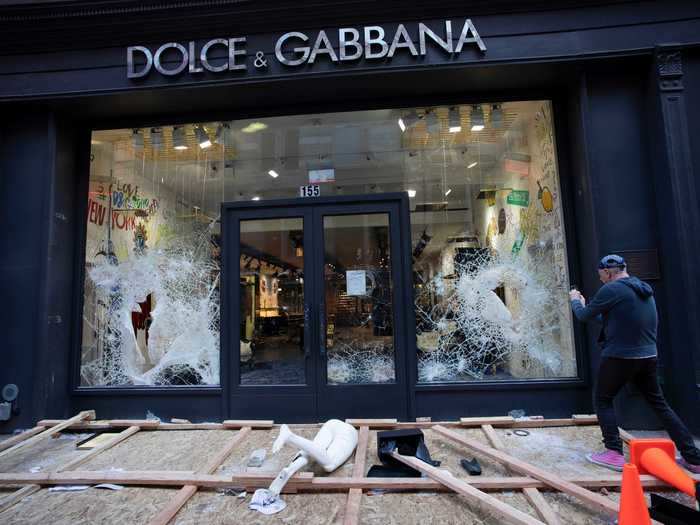 A Dolce & Gabbana location in Manhattan was also targeted by looters, who smashed the glass windows of the storefront ...