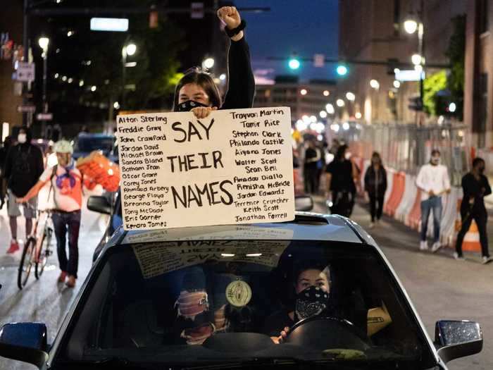 Signs and chants with the names of other victims of police brutality have been seen throughout protests.