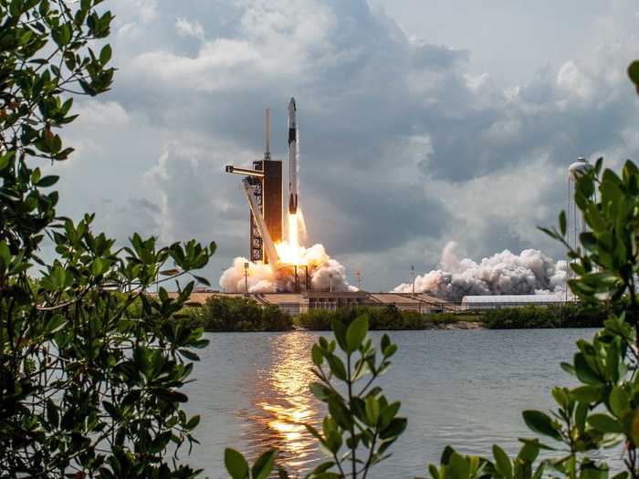 Blastoff came at 3:22 p.m. ET on Saturday. The Crew Dragon spacecraft, later named "Endeavor" in an ode to the final space shuttle, flew atop one of SpaceX