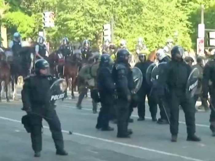 Police on horseback followed closely behind.