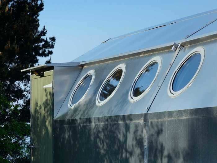 Portholes along the sides add ventilation and additional views.