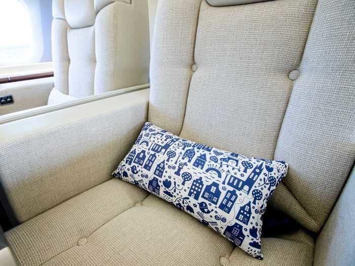 Even the seat pillows feature representations of the Netherlands, such as the Dutch-style houses in blue.