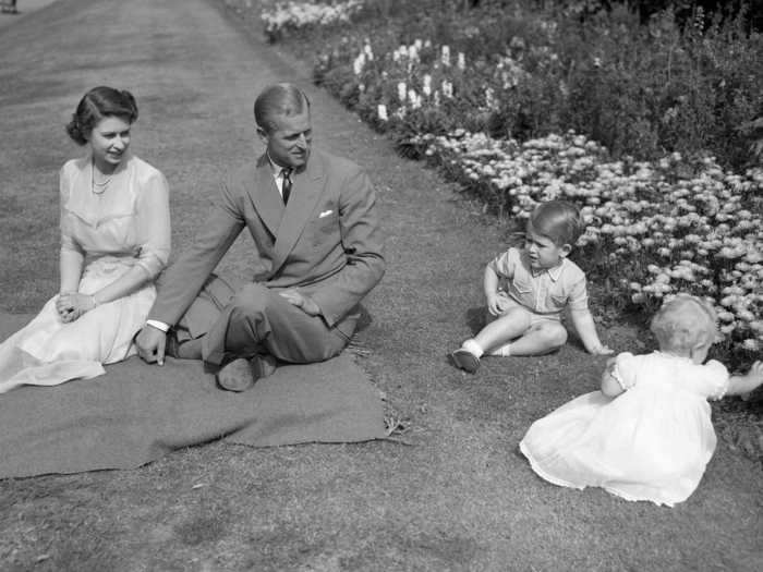 She and her growing family sat for an informal portrait at Clarence House in 1951.