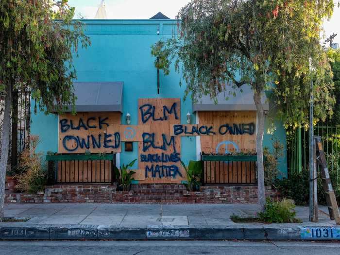 Stores along Abbot Kinney, a popular shopping area for locals and tourists alike, were boarded up. Some, like the restaurant Neighbor (seen below), left messages on the wooden planks expressing support of the Black Lives Matter movement and denoting that it is a black-owned business.