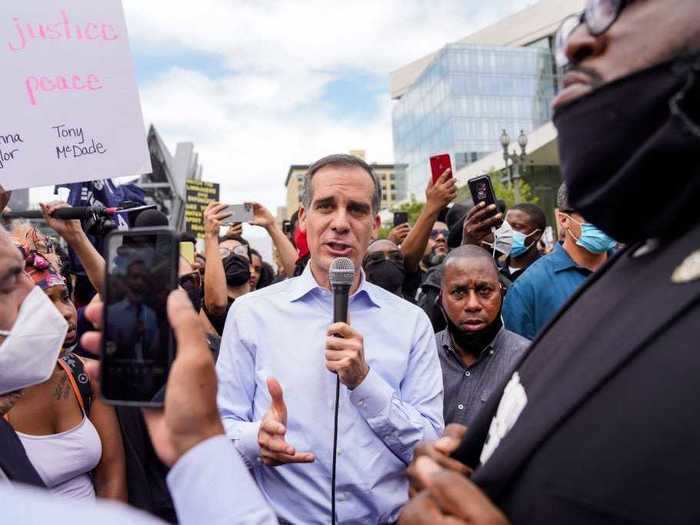 In Los Angeles, thousands of people rallied outside Mayor Eric Garcetti