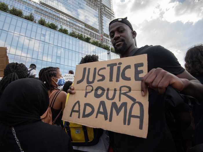 The protest called for justice over the July 2016 death of Adama Traore, 24, who died in a police van after three gendarmes used their full weight to pin him to the ground.