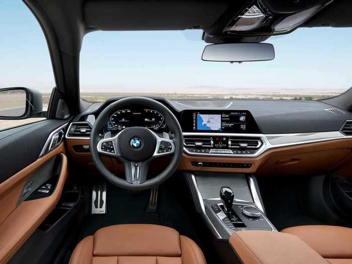 The interior is driver-focused, with newly designed seats.
