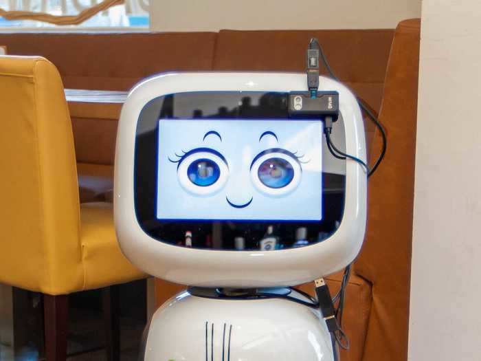 First, concierge robot "Jaime" greets customers at the door.