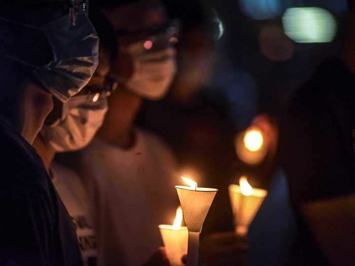 Those who did not attend the protests in person were encouraged to stand in solidarity by lighting candles in their windows.